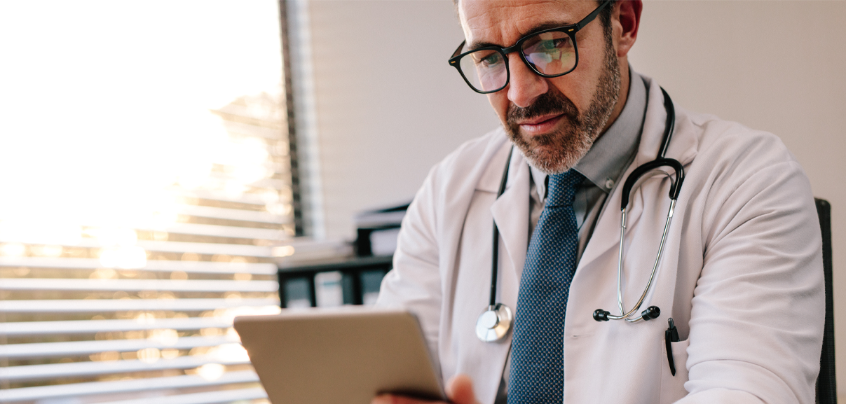 Physician with tablet.png